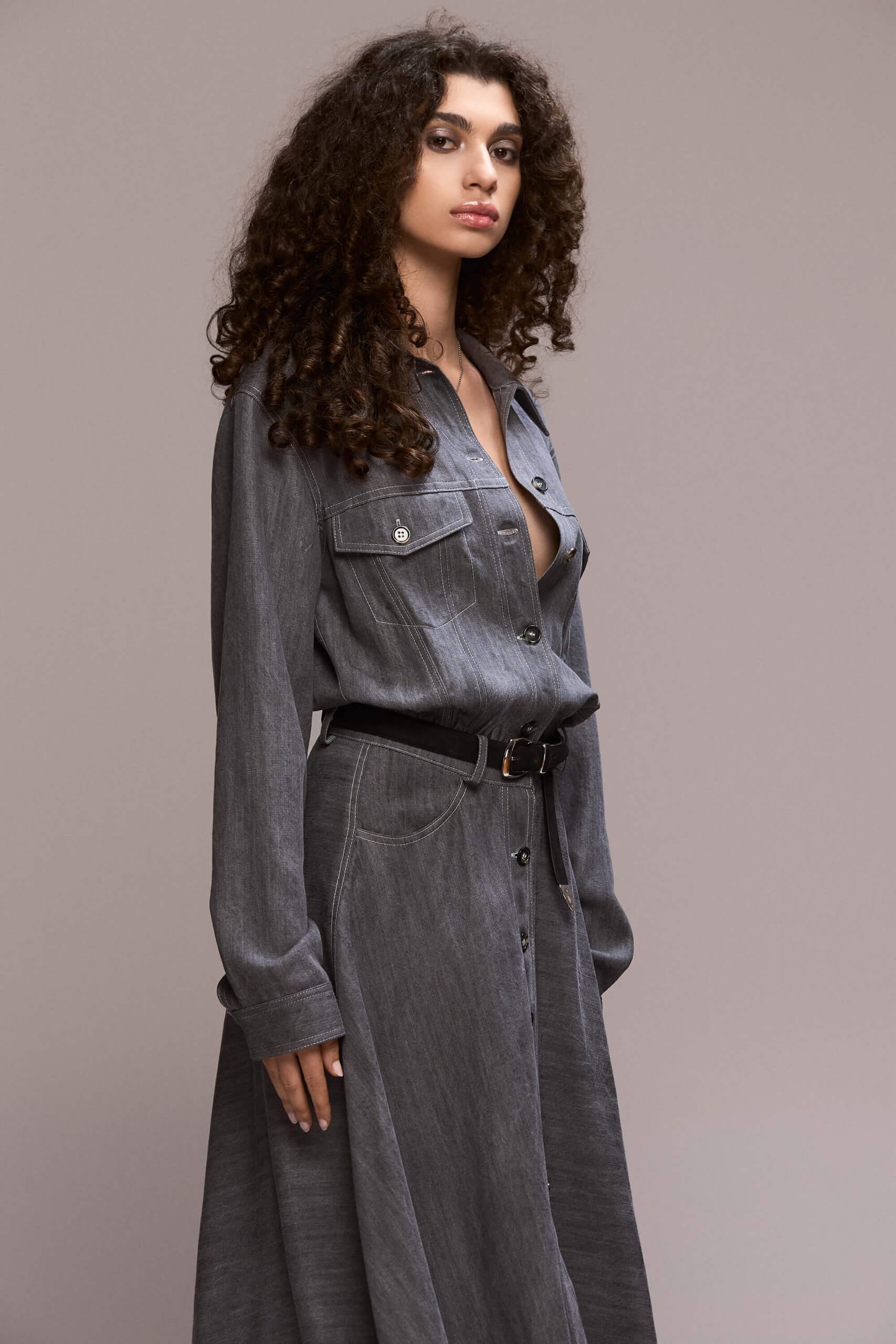 Designed with a timeless silhouette, this dress features striking white contrast stitching that defines its structure and adds a modern edge. With collared neckline and full length front button closure, front pockets, you can wear it with a belt to cinch the waist for a flattering fit.