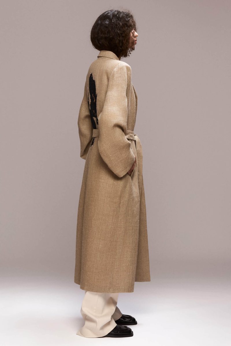 Crafted from hemp, this coat offers a lightweight yet sophisticated layer. It features a hand embroided lily on the back and and it has a unique and relaxed silhouette.