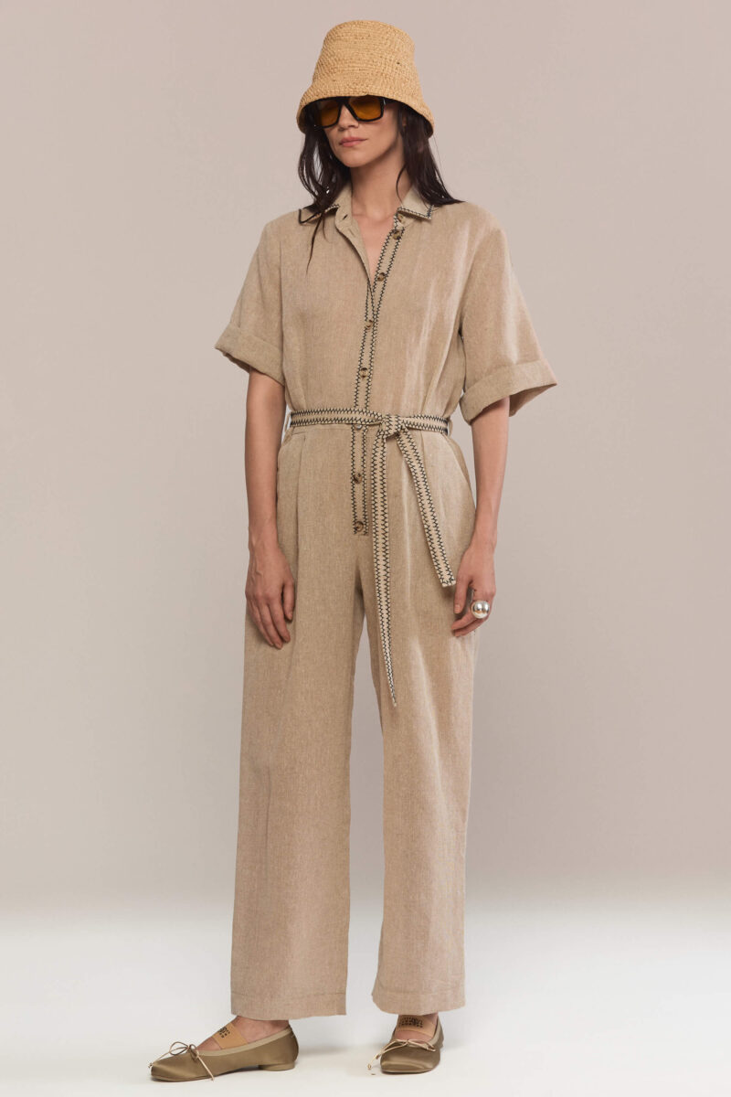 Designed with a relaxed wide-leg silhouette and a classic button-front collar, our hand stitched jumpsuit offers an elegant yet breathable look. Hand-stitched seams and the belt define the waist with a feminine touch.