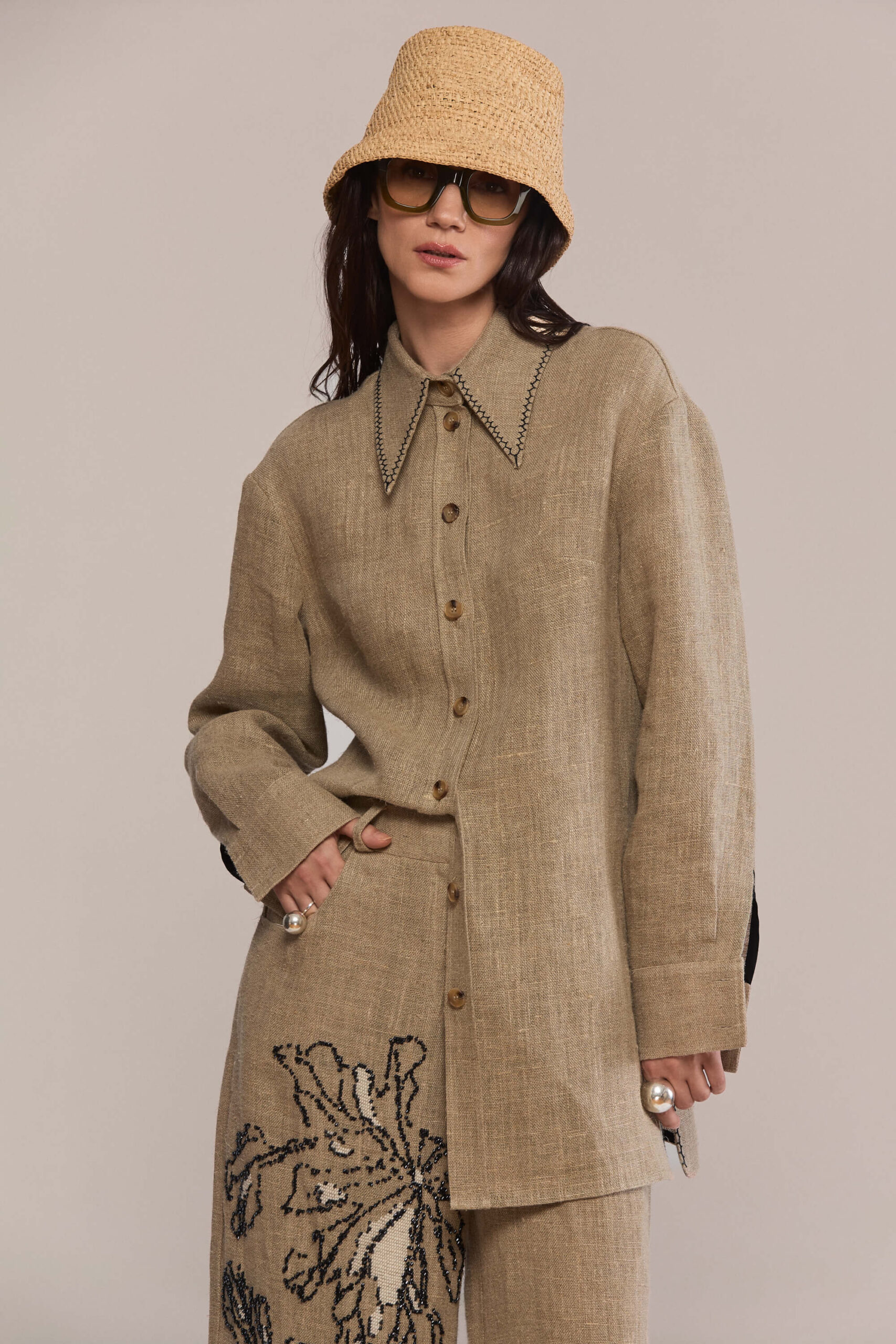 A hand-embroidered hemp shirt in a relaxed silhouette, blending craftsmanship and sustainability. Complete the look with our matching trousers for effortless total look.